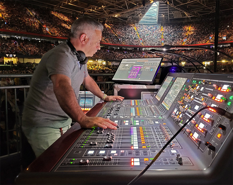 FOH Engineer: Matteo Cifelli Sound engineer Matteo Cifelli mixing sound in an arena concert.